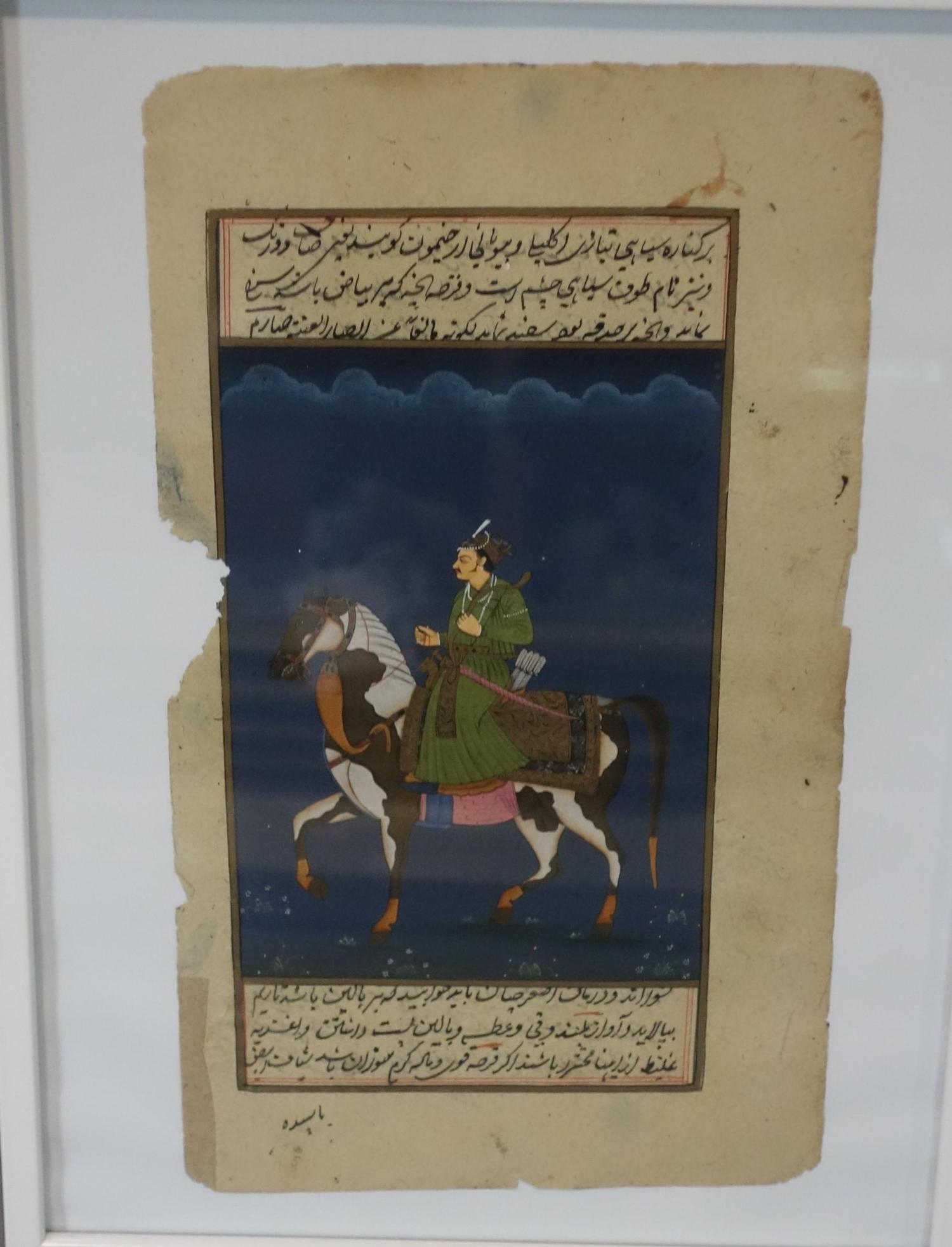 A Persian illuminated manuscript page of a chevalier, 30 x 22 cm