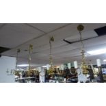 A set of 4 Brass chandeliers