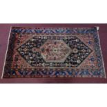 A North West Persian Zanjan Rug, the central diamond medallion with repeating petal motifs, on a