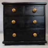 A Victorian black painted pine chest of drawers, H.74 W.76 D.45cm