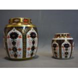 Two Royal Crown Derby porcelain ginger jars, biggest H.19cm, smallest H.12cm