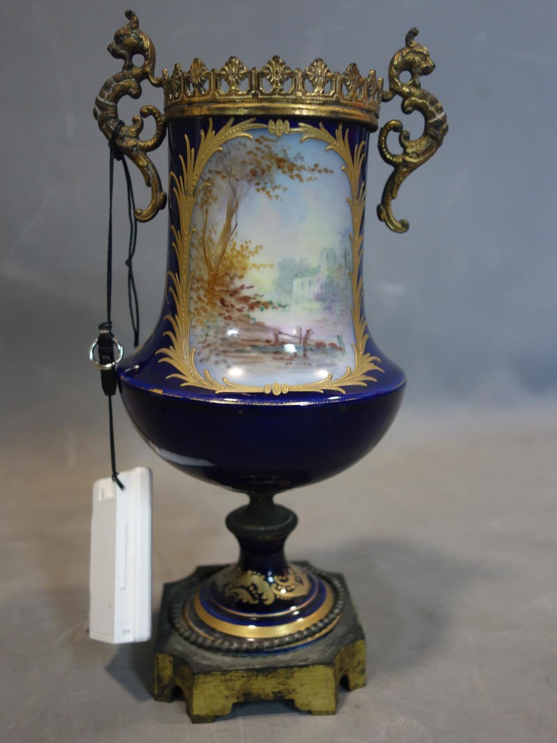 A 19th century French porcelain and gilt metal urn, signed and lacking cover, together with a 19th - Image 3 of 3