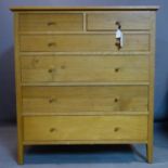 A contemporary oak chest of two short over four graduating drawers, on square tapered feet, H.115