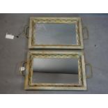 A pair of mirrored and gilt metal serving trays, 69 x 40cm