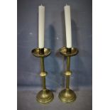 A pair of brass church candlesticks, H. 70 cm