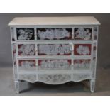 A contemporary grey painted chest of drawers, with Venetian style painted mirrored panels, H.88 W.
