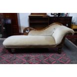 A Victorian mahogany chaise longue with velour upholstery