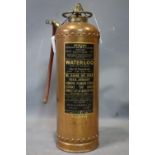 A vintage Waterloo copper fire extinguisher, made in 1964, H.60cm