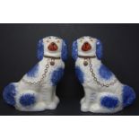 A pair of Staffordshire dogs, marked to bases, H.24cm