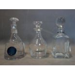 Three crystal glass decanters
