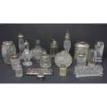 A collection of cut glass salts, pepperettes and bottles, together with cut glass salts with