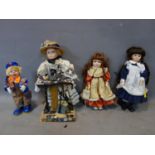 Four vintage dolls, to include a young girl at a podium, H.45cm, and a musical clown (4)