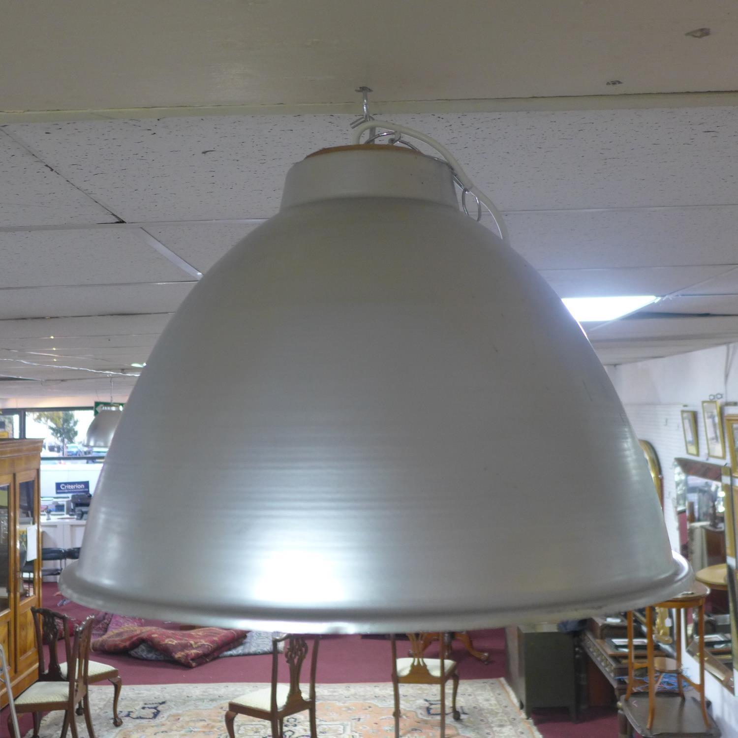 A set of 4 large vintage industrial aluminium light shades, diameter 49 cm