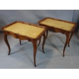 A pair of French style mahogany tray tables on cabriole supports