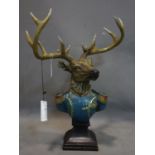 A contemporary moulded model of a stag in officer uniform, H.61cm