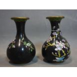 A pair of Chinese cloisonne enamel and brass vases, decorated with a bird by a cherry blossom tree