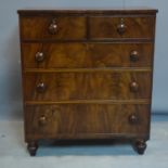 A 19th century flame mahogany chest of two short over three long drawers, on turned feet, H.104 W.91