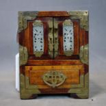 A small Chinese jewel box chest with decorative brass fittings, lock and jade insets, 178mm high x