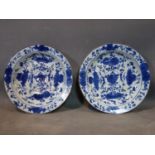 A pair of large Chinese blue and white deep dishes, Kangxi, diam. 31 cm, 18th century