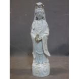 Blanc de Chine Chinese porcelain figure of Guanyin standing on a plinth, H. 44cm.