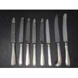 A collection of eight silver handled knives, to include four by Terry Shaverin, Sheffield 1993 (8)