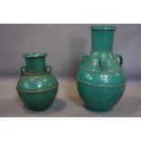 Two Moroccan glazed water pots, from Fez, comprising one larger example with four handles, H.60cm,