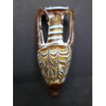 Ancient Phoenician sand core-formed Amphoriskos, light brown glass wound with blue, yellow, and