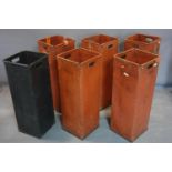 Six vintage post office mail bins with makers stamp "Crown Containers", comprising 5 red and 1