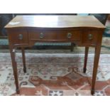 A small early 20th century desk on tapered legs, H 78cm W 92cm D 53cm