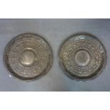 A pair of pierced Indian embossed plates, silver plated, second half 20th century