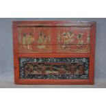 A Chinese carved wood panel with fighting warriors and gaming scene, gold lacquer with some colour