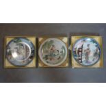 Three contemporary Chinese plates depicting domestic scenes in their original boxes, 1986