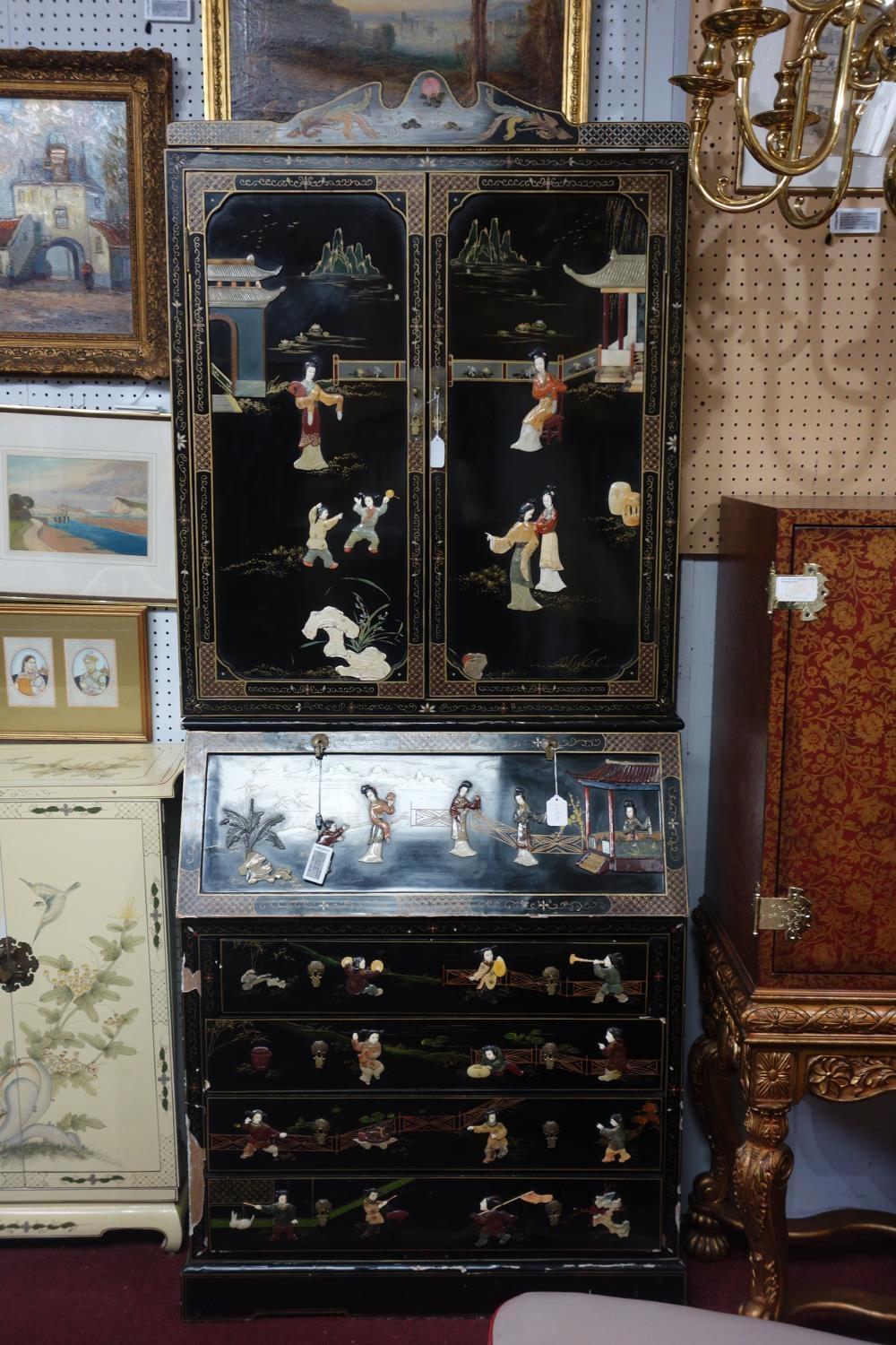 A Chinese style lacquered bureau bookcase, with allover figural decoration. H.225 W.93 D.50cm