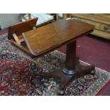 A 19th century mahogany adjustable reading table, with 2 hinged reading stands to top, with