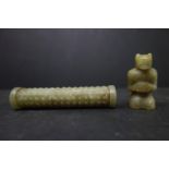 Two small Chinese jade carvings of a figure and a scroll, 19th century, approx. H.7 cm