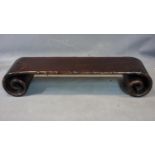 A Chinese hardwood scroll form low table H.20 W.107 D.26cm