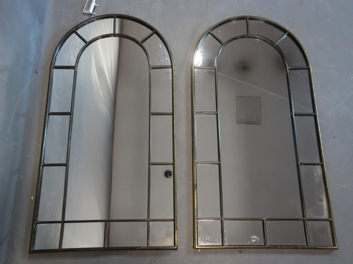 A pair of arched top garden mirrors, 107 x 54cm