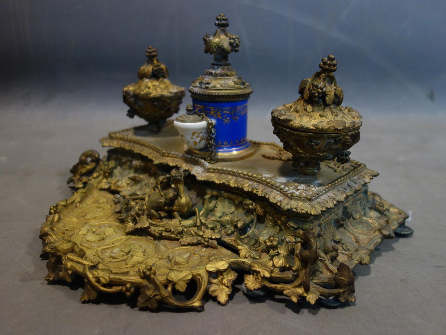 A 19th century French ormolu ink desk stand, with central porcelain pot and applied animals, H.20 - Image 3 of 5