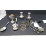 A mixed collection of silver, to include two salts, a small cup with gilded interior, teaspoons,