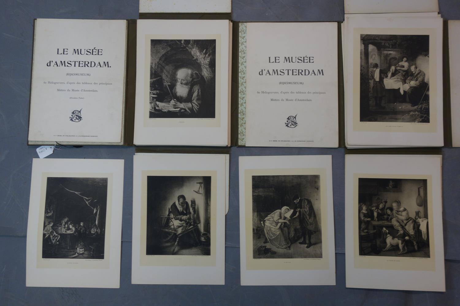 Two folders each containing 60 Heliogravures of the principal paintings in the Rijkmuseum,