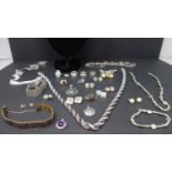 A collection of jewellery, to include a silver necklace marked 925; a natural pearl necklace; a