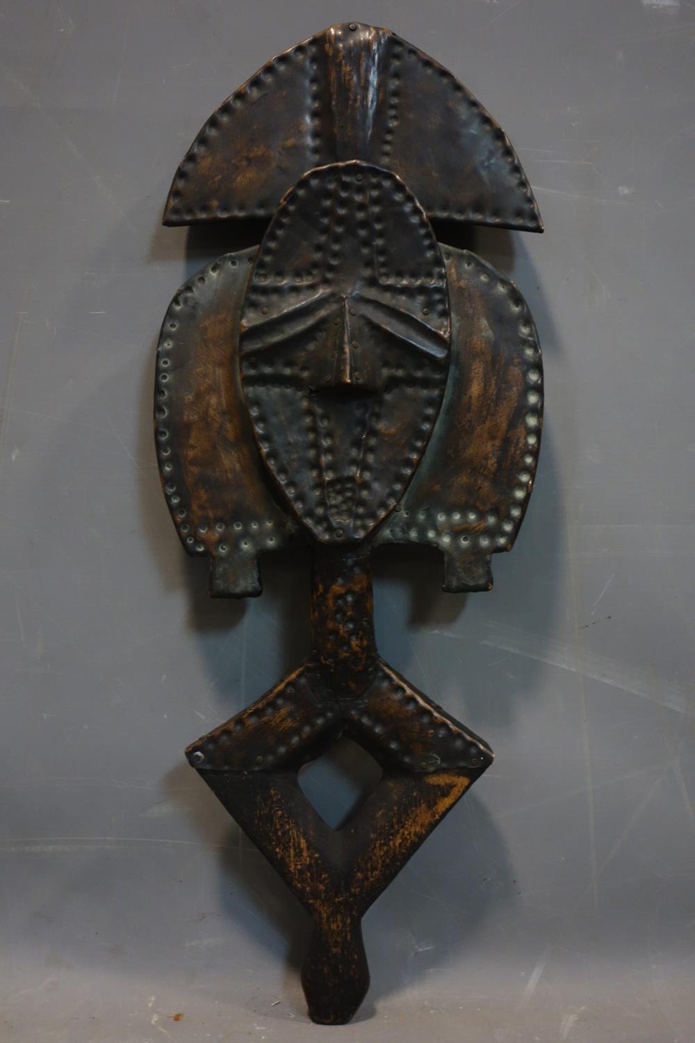 A Central African tribal Kota reliquary figure, Gabon, wood and copper, H.54.5cm