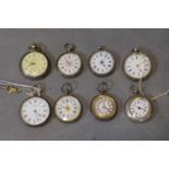 A collection of various silver and white metal and brass cased pocket watches, set with white enamel