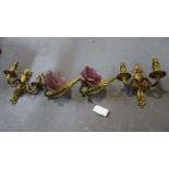 Two pairs of early 20th century gilt metal wall lights