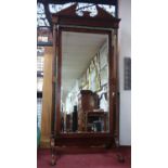 A large Georgian style mahogany cheval mirror, with broken arch pediment top, raised on cabriole