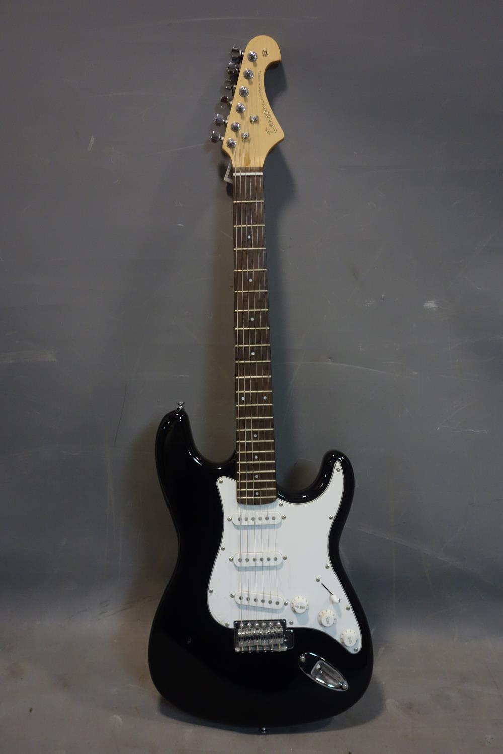 A Tenson California Series electric guitar, with soft case