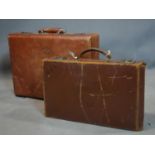 A Barclay brown leather suitcase, H.34 W.45 D.10cm, together with a brown leather writing case, H.25