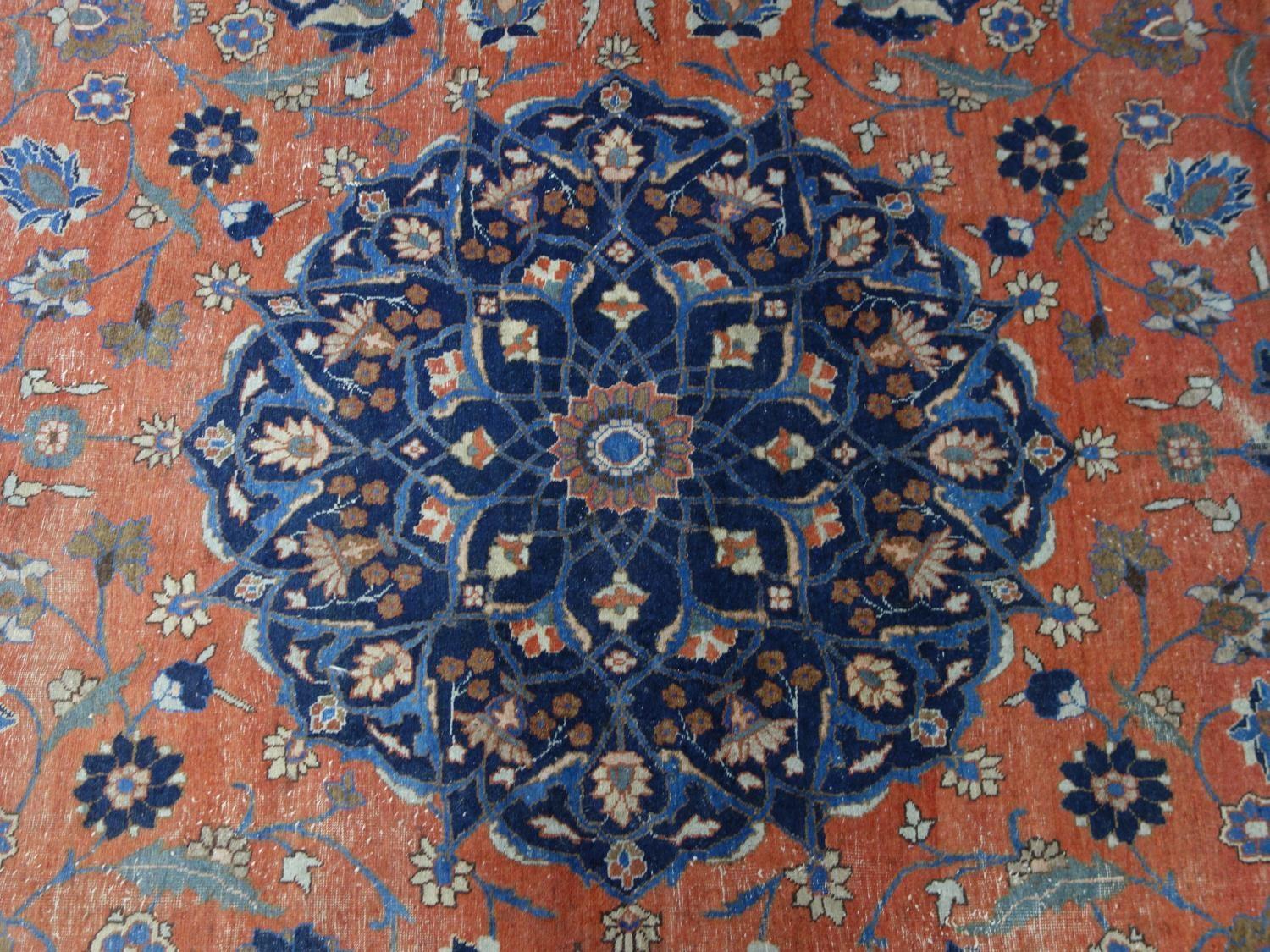 An early 20th century north east Persian Meshad carpet, the central blue floral medallion, on a - Bild 2 aus 6