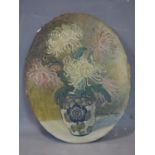 An early 20th century oval oil on canvas, still life of flowers, indistinctly signed and dated 1919,