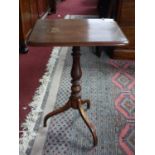 A 19th century mahogany lamp table, raised on turned support and splayed legs, H.73 W.52 D.43cm